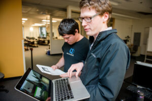 Students in the program Energy Systems and Climate Change calculate energy conversions on Tues., Feb. 16, 2016. The students are studying the impacts of energy use on climate change, and are researching the potential impacts of using alternative energy sources such as solar. Students are working in teams to propose real-life projects that reduce humans' dependence on non-renewable sources of energy. A student group works on a research-backed proposal to install solar panels on Evergreen's Covered Pavillion.