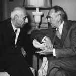 Secretary Dean Acheson (right) confers with Prime Minister Mohammed Mossadegh of Iran (left) in Washington D.C.