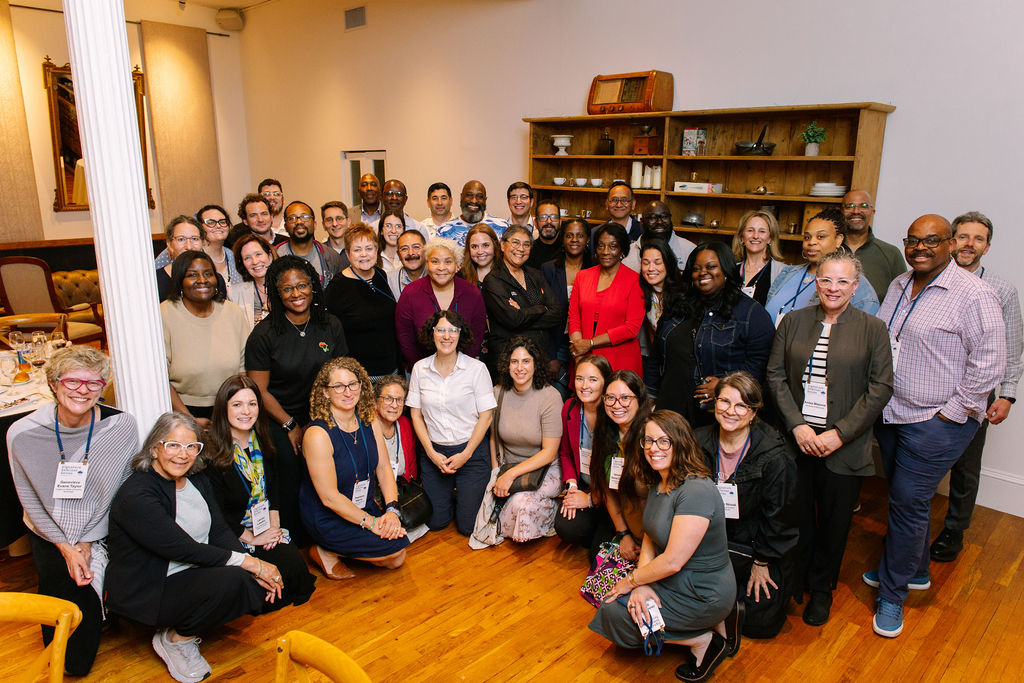 Group of people standing in rows